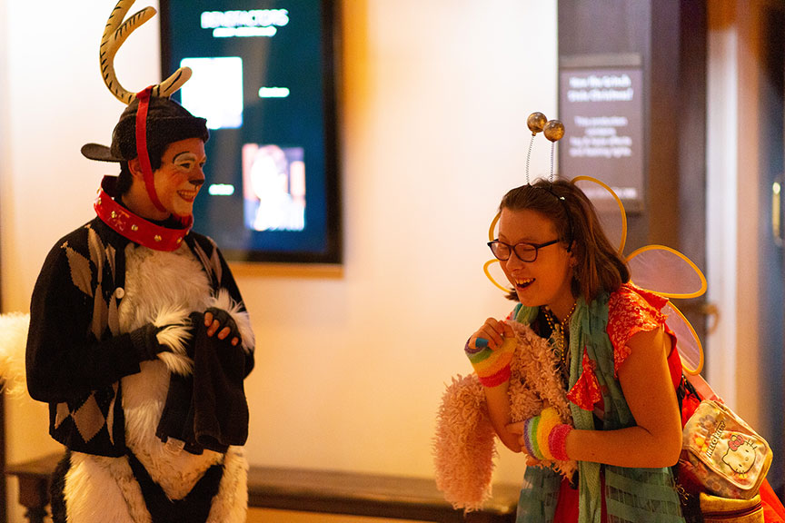 Audience and cast members following the 2018 sensory-friendly performance of Dr. Seuss's How the Grinch Stole Christmas!, book and lyrics by Timothy Mason, music by Mel Marvin, original production conceived and directed by Jack O'Brien, original choreography by John DeLuca, and directed by James Vásquez, at The Old Globe. Photo by Rich Soublet II.
