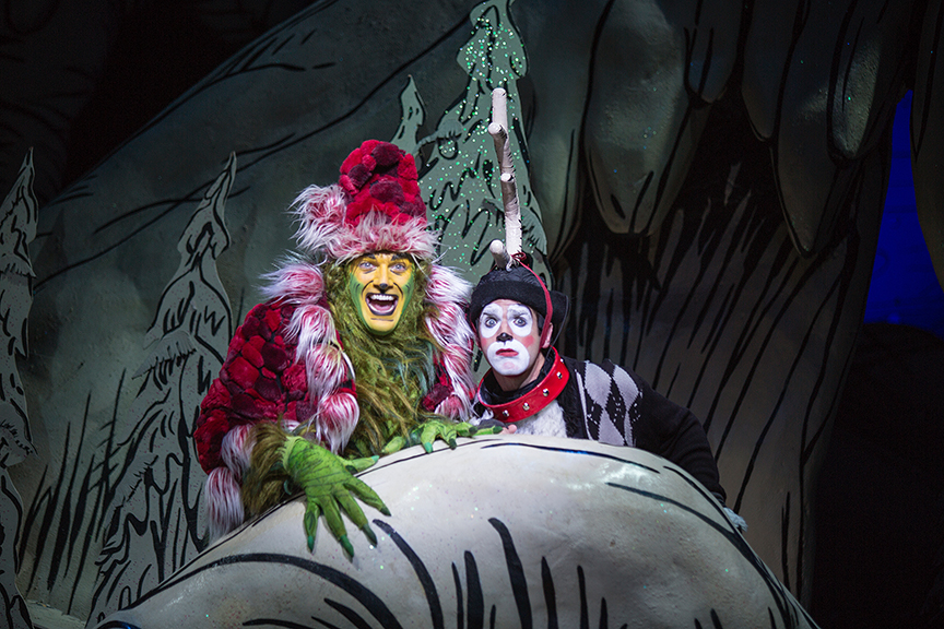 (from left) Edward Watts appears as The Grinch and Dan DeLuca as Young Max in Dr. Seuss's How the Grinch Stole Christmas!, book and lyrics by Timothy Mason, music by Mel Marvin, original production conceived and directed by Jack O'Brien, original choreography by John DeLuca, and directed by James Vásquez, running November 4 – December 24, 2017 at The Old Globe. Photo by Jim Cox.