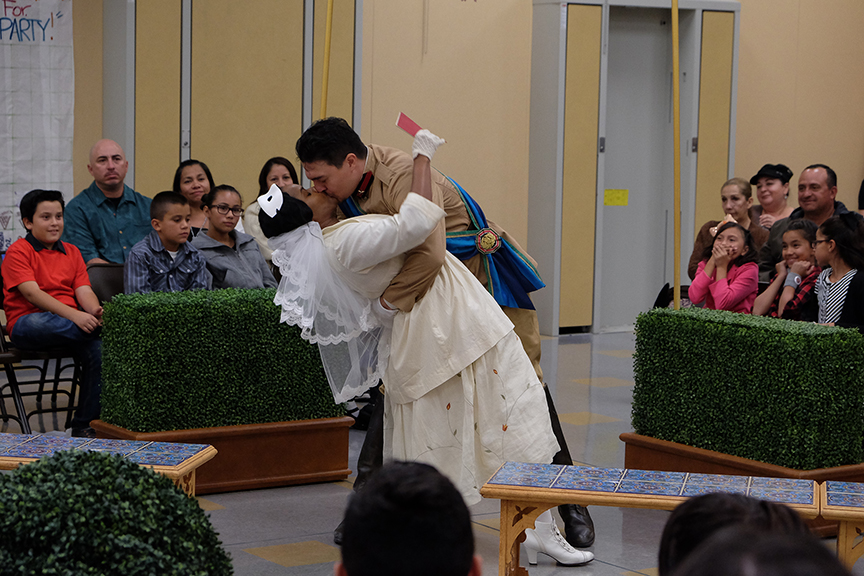 Monique Gaffney as Beatrice and Christopher Salazar as Benedick performing for the audience from South Bay Community Services at Castle Park Elementary School. The 2015 production of The Old Globe's touring program Globe for All, Shakespeare's Much Ado About Nothing, directed by Rob Melrose, tours community venues Nov. 10 - 22. Photo by Ken Jacques. 
