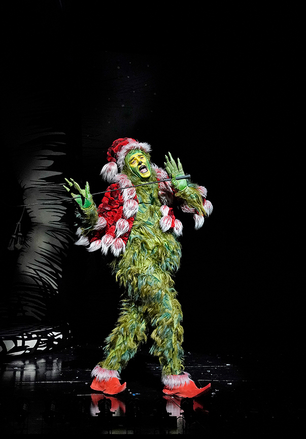 (from left) Edward Watts appears as The Grinch in Dr. Seuss's How the Grinch Stole Christmas!, 2018. Book and lyrics by Timothy Mason, music by Mel Marvin, original production conceived and directed by Jack O'Brien, original choreography by John DeLuca, and directed by James Vásquez, running November 10 – December 29, 2019 at The Old Globe. Photo by Ken Howard.