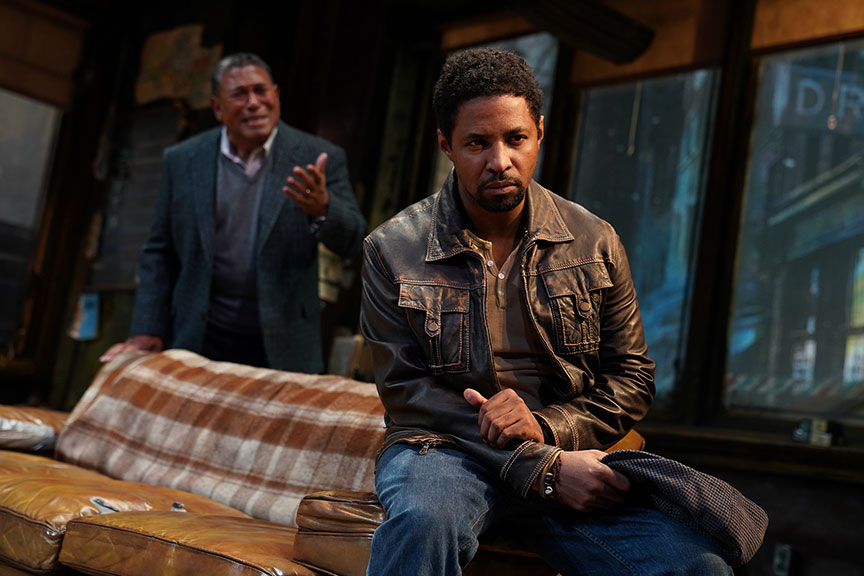 Steven Anthony Jones as Becker (background) and Amari Cheatom as Youngblood in August Wilson’s Jitney, directed by Ruben Santiago-Hudson, runs January 18 – February 23, 2020 at The Old Globe. Photo by Joan Marcus.