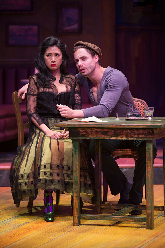 Liza Lapira as Suzanne and Philippe Bowgen as Pablo Picasso in Picasso at the Lapin Agile, by Steve Martin, directed by Barry Edelstein, running February 4 - March 12, 2017 at The Old Globe. Photo by Jim Cox.