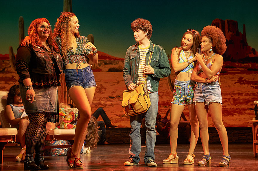 (from left) Katie Ladner as Sapphire, Solea Pfeiffer as Penny Lane, Casey Likes as William Miller, Julia Cassandra as Estrella, and Storm Lever as Polexia. Almost Famous, a world-premiere musical with book and lyrics by Cameron Crowe, based on the Paramount Pictures and Columbia Pictures motion picture written by Cameron Crowe, directed by Jeremy Herrin, with original music and lyrics by Tom Kitt, 2019. Photo by Neal Preston.