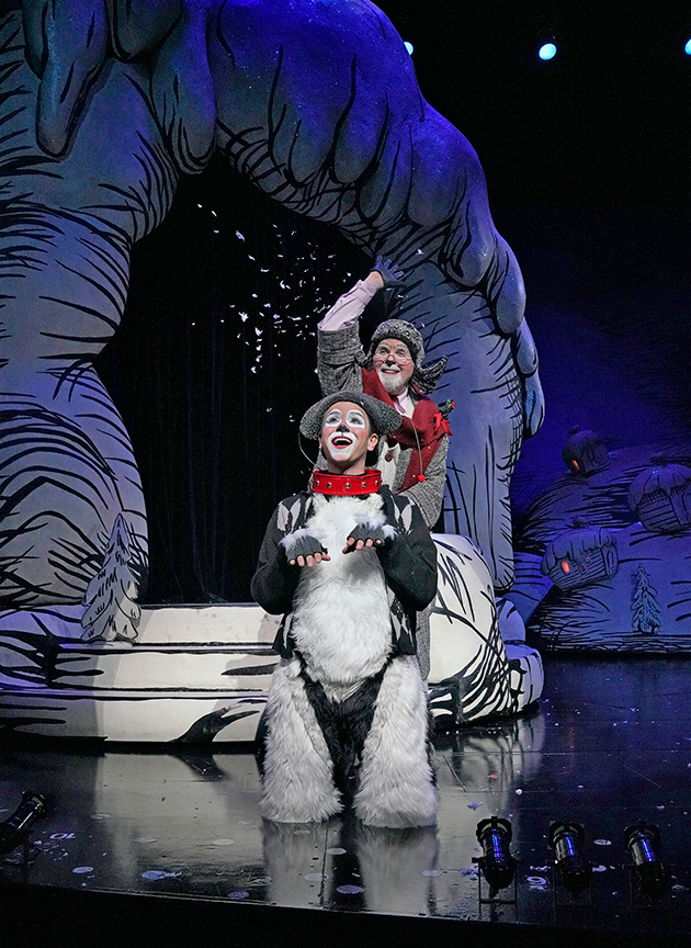 (front) Tommy Martinez appears as Young Max and Steve Gunderson as Old Max in Dr. Seuss's How the Grinch Stole Christmas!, book and lyrics by Timothy Mason, music by Mel Marvin, original production conceived and directed by Jack O'Brien, original choreography by John DeLuca, and directed by James Vásquez, running November 3 – December 29, 2018 at The Old Globe. Photo by Ken Howard.