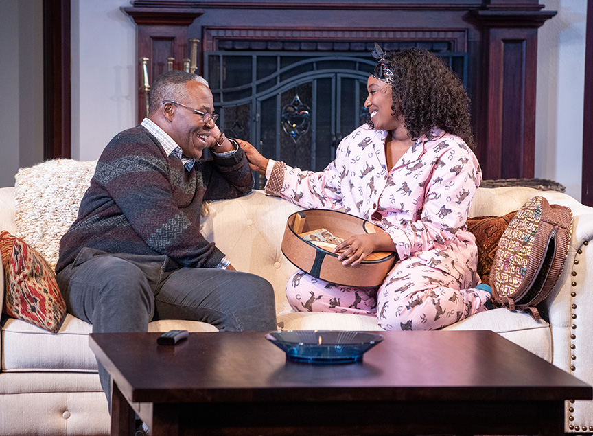 Danny Johnson as Donald Chinyaramwira and Olivia Washington as Nyasha in Familiar, running January 26 – March 3, 2019 at The Old Globe. Photo by J.T. MacMillan.
