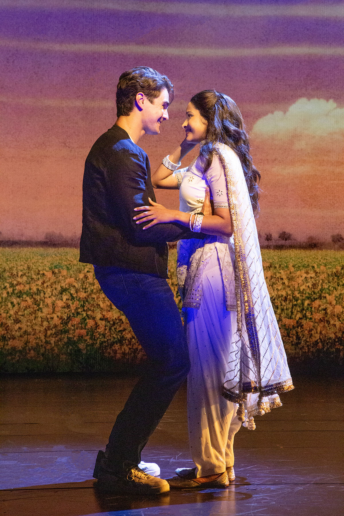  Austin Colby as Roger and Shoba Narayan as Simran in Come Fall in Love – The DDLJ Musical, 2022. Photo by Jim Cox.