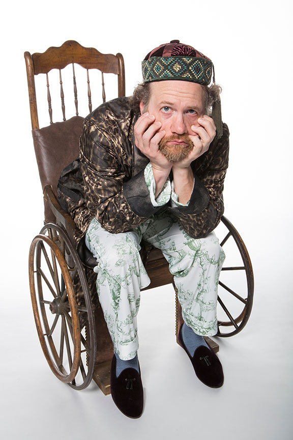 Andy Grotelueschen appears as Argan in the world premiere adaptation of Molière’s The Imaginary Invalid, adapted by Fiasco Theater, running May 27 – July 2, 2017 at The Old Globe. Photo by Jim Cox.