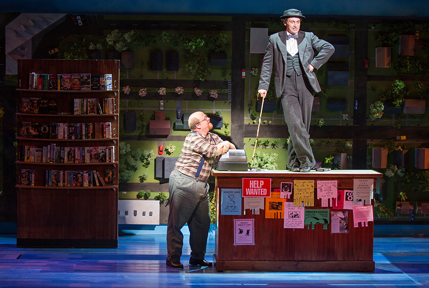 (from left) Jason SweetTooth Williams as Video Store Owner and Bryce Pinkham as Sam  in Benny & Joon, book by Kirsten Guenther, music by Nolan Gasser, lyrics by Mindi Dickstein, directed by Jack Cummings III, running September 7 – October 22, 2017 at The Old Globe. Photo by Jim Cox.