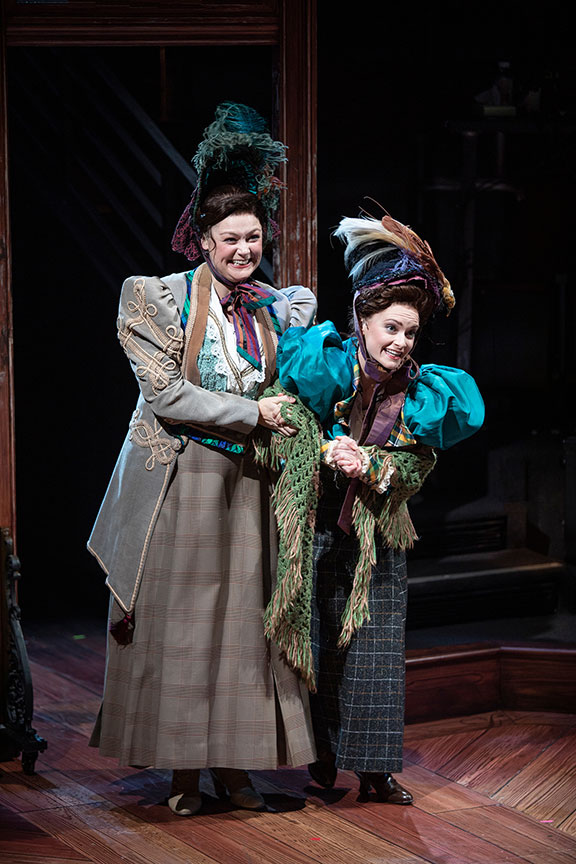 Jacque Wilke as Gertrude Saint and Cathryn Wake as Prudence Saint. Ebenezer Scrooge's BIG San Diego Christmas Show runs November 23 – December 29, 2019 at The Old Globe. Photo by Jim Cox.