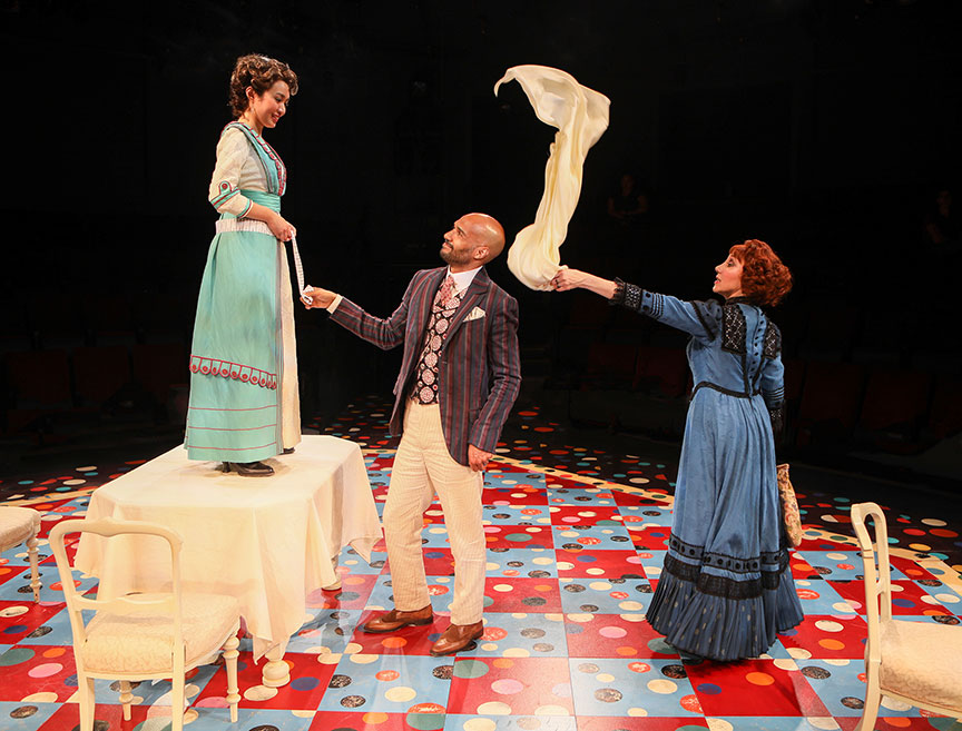 Regina De Vera as Louise Maske, Luis Vega as Frank Versati, and Joanna Glushak as Gertrude Deuter in The Underpants, by Steve Martin, directed by Walter Bobbie, and adapted from Carl Sternheim, running July 27 – September 8, 2019 at The Old Globe. Photo by Jim Cox.