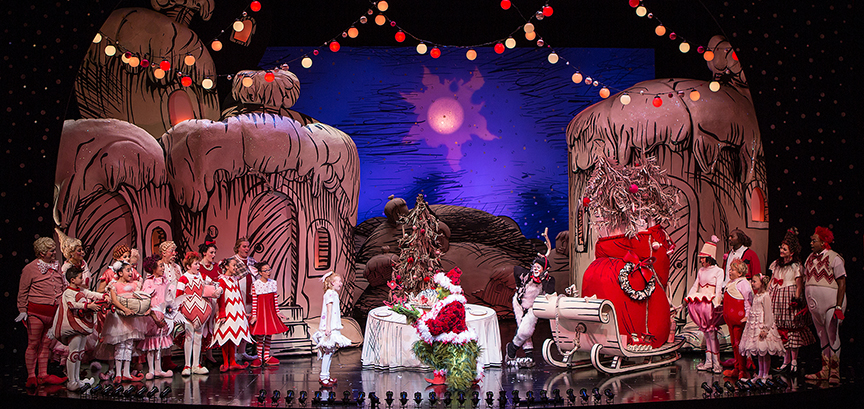 Reese McCulloch (center) with the cast of Dr. Seuss's How the Grinch Stole Christmas!, book and lyrics by Timothy Mason, music by Mel Marvin, original production conceived and directed by Jack O'Brien, original choreography by John DeLuca, and directed by James Vásquez, running November 4 – December 24, 2017 at The Old Globe. Photo by Jim Cox.