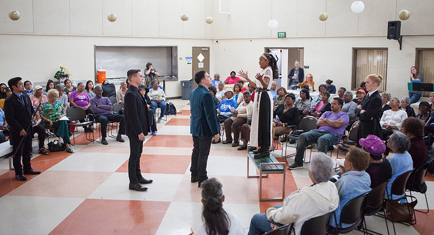 (from left) Flordelino Lagundino as Escalus, Daniel Petzold as Angelo, Christopher Salazar as Duke, Mahka Mthembu as Isabella, and Ally Carey as Provost performing for the audience from Fourth District Senior Resource Center at George Stevens Senior Center. The 2016 production of The Old Globe's touring program Globe for All, Shakespeare's Measure for Measure, directed by Patricia McGregor, tours community venues Nov. 1 - 20. Photo by Jim Cox. 