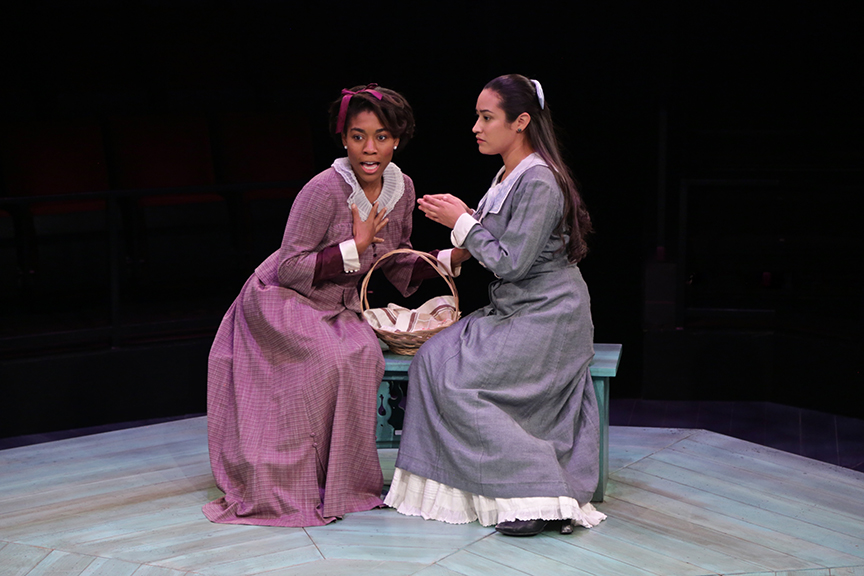 (from left) Christina A. Okolo as Lucetta and Suzelle Palacios as Julia in The Old Globe and University of San Diego Shiley Graduate Theatre Program production of William Shakespeare's The Two Gentlemen of Verona, directed by Richard Seer, November 12 - 20, 2016. Photo by Adriana Zuniga Photography.