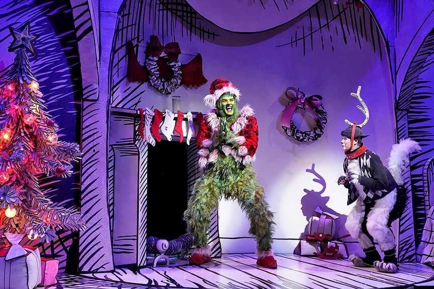 (from left) Edward Watts appears as The Grinch and Tommy Martinez as Young Max in Dr. Seuss's How the Grinch Stole Christmas!, 2018. Book and lyrics by Timothy Mason, music by Mel Marvin, original production conceived and directed by Jack O'Brien, original choreography by John DeLuca, and directed by James Vásquez, running November 10 – December 29, 2019 at The Old Globe. Photo by Ken Howard.