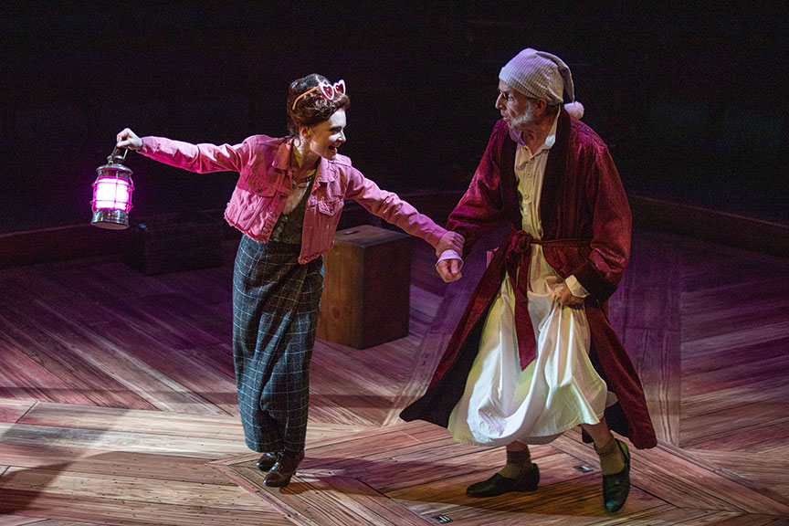 Cathryn Wake as Ghost of Christmas Present and Robert Joy as Ebenezer Scrooge. Ebenezer Scrooge's BIG San Diego Christmas Show runs November 23 – December 29, 2019 at The Old Globe. Photo by Jim Cox.