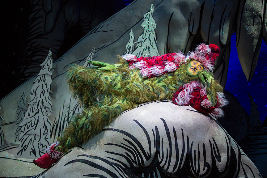 Edward Watts appears as The Grinch in Dr. Seuss's How the Grinch Stole Christmas!, book and lyrics by Timothy Mason, music by Mel Marvin, original production conceived and directed by Jack O'Brien, original choreography by John DeLuca, and directed by James Vásquez, running November 3 – December 29, 2018 at The Old Globe. Photo by Jim Cox.