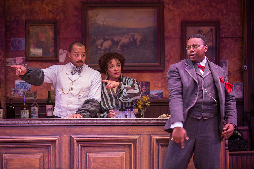 (from left) Donald Faison as Freddy, Luna Veléz as Germaine, and Marcel Spears as Charles Dabernow Schmendiman in Picasso at the Lapin Agile, by Steve Martin, directed by Barry Edelstein, running February 4 - March 12, 2017 at The Old Globe. Photo by Jim Cox.