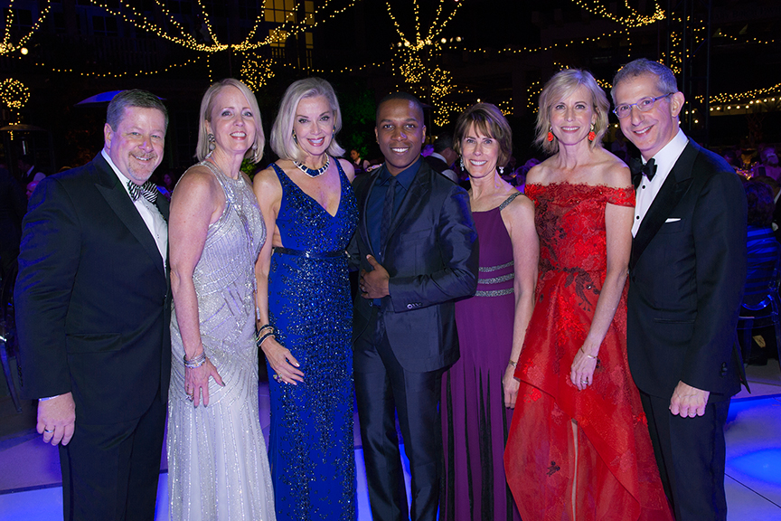 Gala performer and Tony Award winner Leslie Odom, Jr. (center) with (from left) Old Globe Managing Director Michael G. Murphy; Gala Co-Chairs Sheryl White, Karne Cohn, Nina Doede, and Laurie Mitchell; and Old Globe Artistic Director Barry Edelstein at the 2016 Globe Gala - A Night of Revels - on Saturday, September 24, 2016. Photo by Bob Ross.