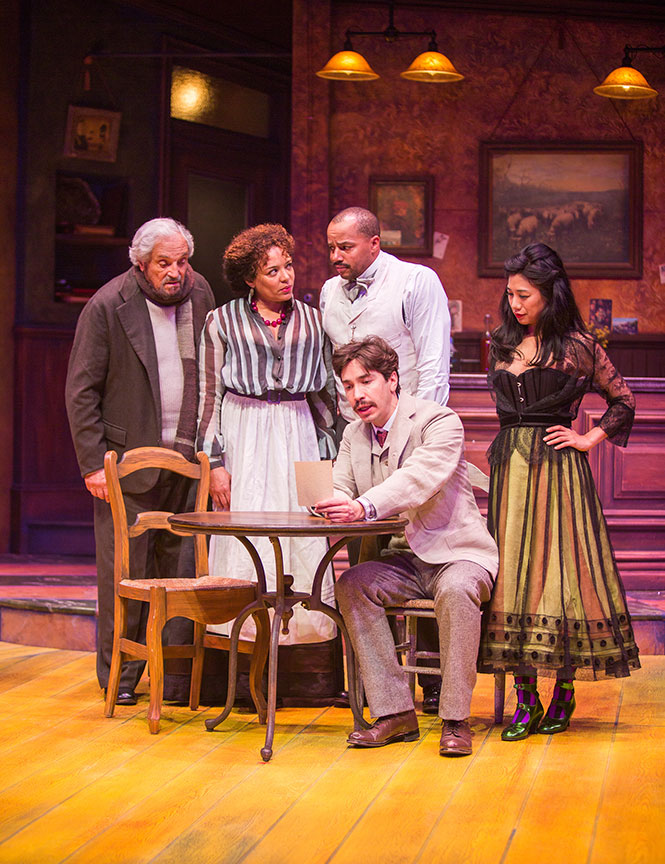 (from left) Hal Linden as Gaston, Luna Veléz as Germaine, Donald Faison as Freddy, Justin Long as Albert Einstein, and Liza Lapira as Suzanne in Picasso at the Lapin Agile, by Steve Martin, directed by Barry Edelstein, running February 4 - March 12, 2017 at The Old Globe. Photo by Jim Cox.