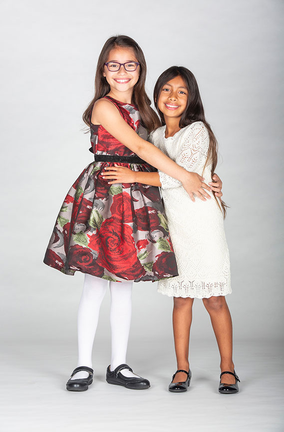 Sadie Tess Coleman and Leila Manuel appear as Cindy-Lou Who in Dr. Seuss's How the Grinch Stole Christmas!, book and lyrics by Timothy Mason, music by Mel Marvin, original production conceived and directed by Jack O'Brien, original choreography by John DeLuca, and directed by James Vásquez, runs November 3 – December 29, 2018 at The Old Globe. Photo by Jim Cox.