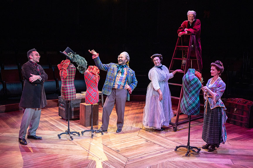 George Abud as Medium Scrooge, Orville Mendoza as Mr. Fezzi, Jacque Wilke as Ghost of Christmas Past, Bill Buell as Ebenezer Scrooge, and Cathryn Wake as Lavinia in Ebenezer Scrooge's BIG San Diego Christmas Show, 2021. Photo by Jim Cox.