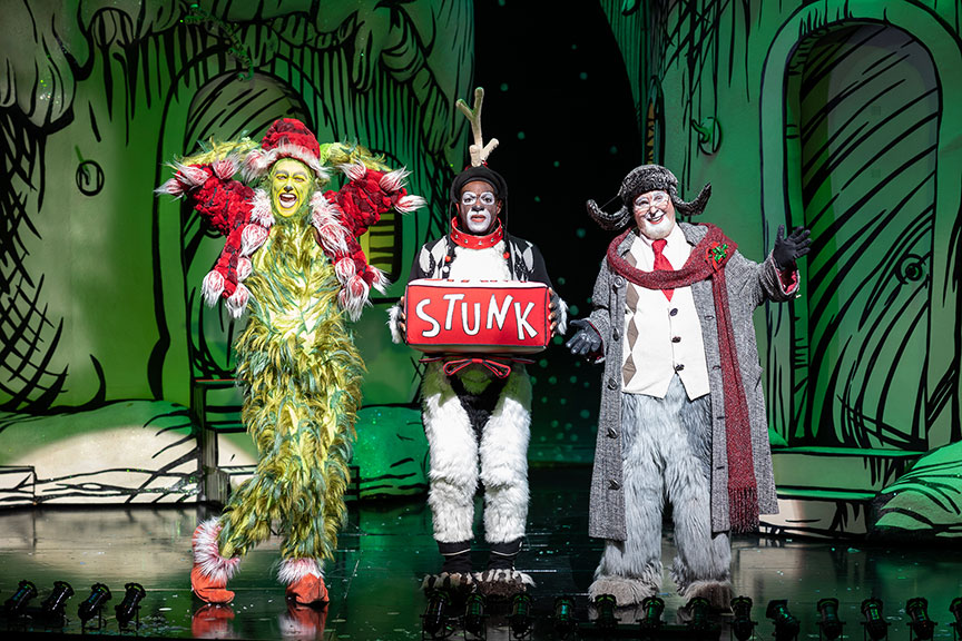 Andrew Polec as The Grinch, Tyrone Davis, Jr. as Young Max, and Steve Gunderson as Old Max in Dr. Seuss's How the Grinch Stole Christmas!, 2022. Photo by Rich Soublet II.